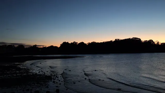 Horizontal video: Calming coastal sunrise with gentle waves 28960568. Duration: 11 seconds. Resolution: 1920x1080