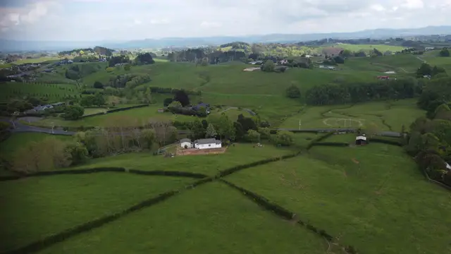 Horizontal video: Scenic aerial footage of rural new zealand 29014735. Duration: 60 seconds. Resolution: 3840x2160