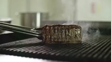 Horizontal video: Grilling a steak on a pan grill 3191290. Duration: 20 seconds. Resolution: 3840x2160