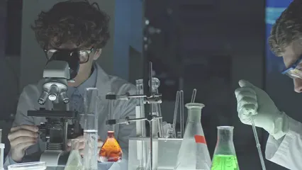 Horizontal video: A man and a woman working in a laboratory 3214535. Duration: 11 seconds. Resolution: 3840x2160