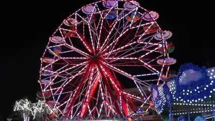Horizontal video: A red ferris wheel 3509314. Duration: 9 seconds. Resolution: 1920x1080