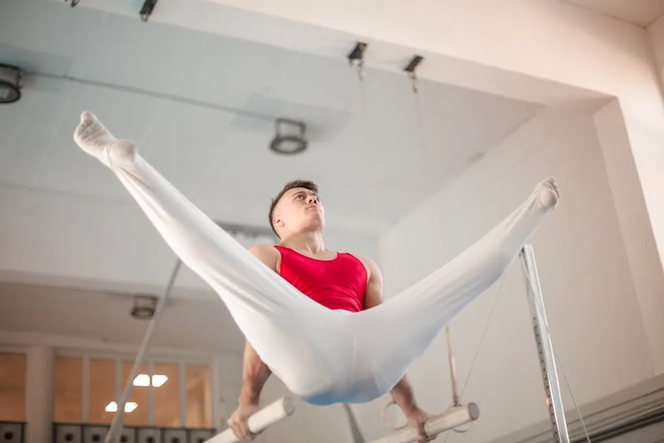 Photo of Male Gymnast Practicing in Gym