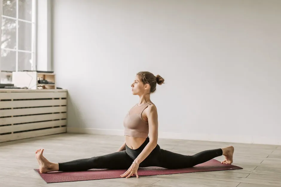 A Woman Splitting on a Yoga Mat