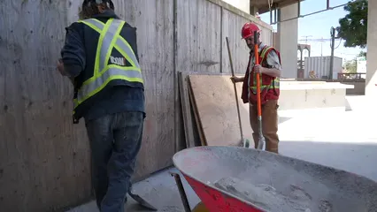 Horizontal video: Construction workers using shovels and wheelbarrow 5434222. Duration: 47 seconds. Resolution: 1920x1080