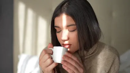 Horizontal video: Close up video of a woman drinking a cup of tea 6421412. Duration: 30 seconds. Resolution: 3840x2160
