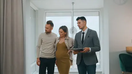 Horizontal video: A realtor showing a house to a couple 7646612. Duration: 15 seconds. Resolution: 3840x2160