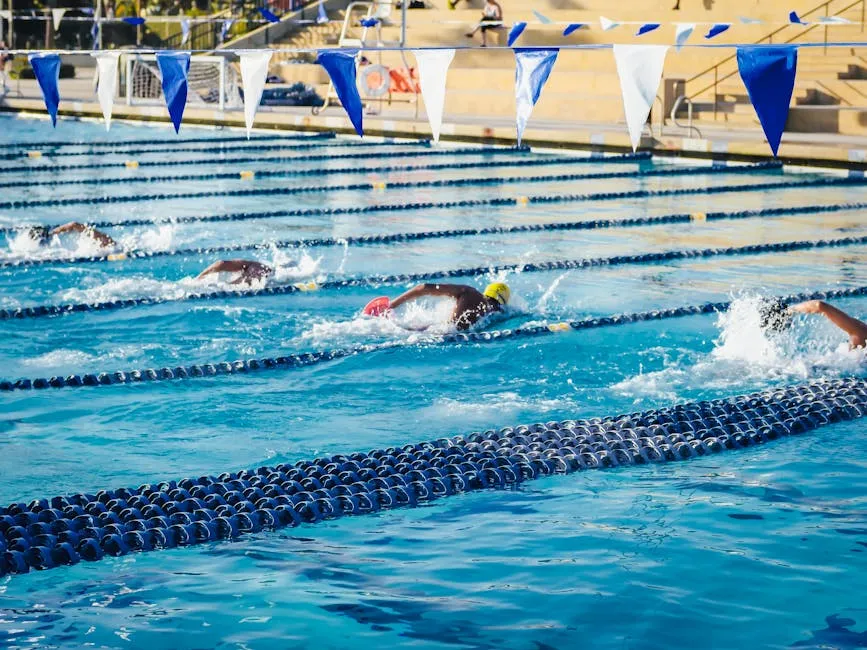 People Swimming in an Olympic Swimming Pool