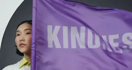 Horizontal video: Woman posing with kindness flag 6484273. Duration: 22 seconds. Resolution: 4096x2160