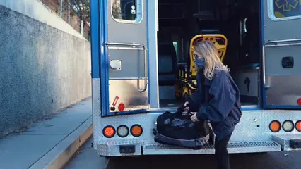 Horizontal video: Paramedic taking care of a man 6520291. Duration: 9 seconds. Resolution: 3840x2160