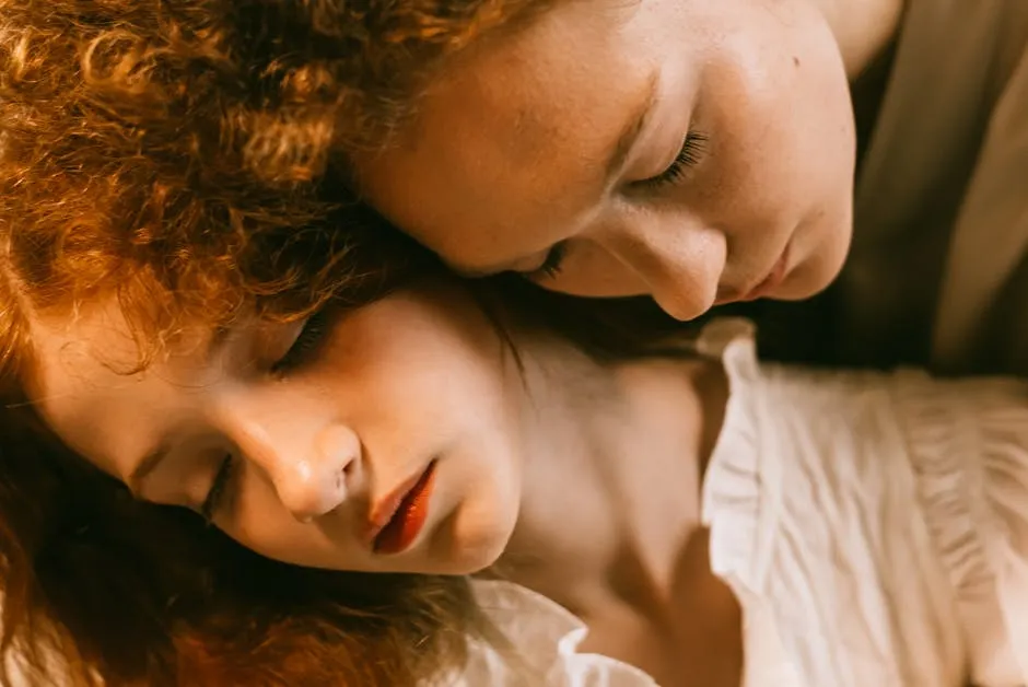 Women Embracing with Eyes Closed