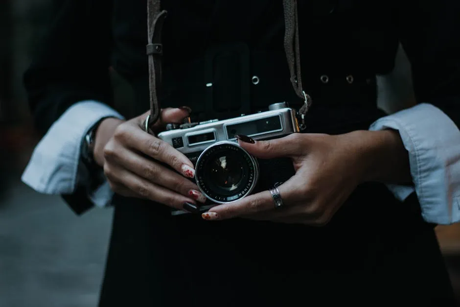 Close-up of Vintage Camera Held by Woman