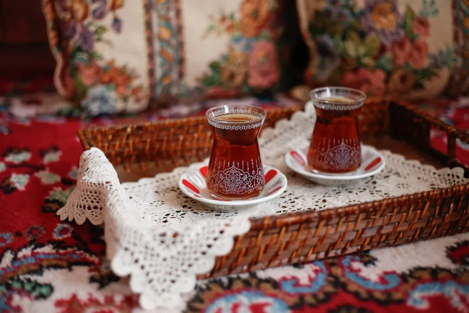 Traditional Tea in Ornate Glasses on Lace Tray