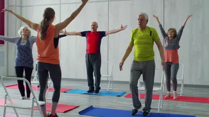 Horizontal video: A woman fitness instructor teaching the group of elderly people some exercises fitted for them 3196293. Duration: 15 seconds. Resolution: 3840x2160