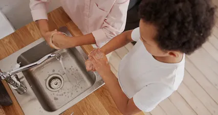 Horizontal video: A mother teaching her kid how to wash hands 7123787. Duration: 16 seconds. Resolution: 2048x1080