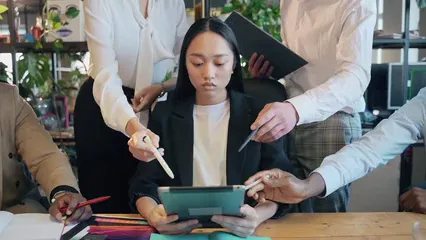 Horizontal video: Confused woman sitting while holding a tablet 7165697. Duration: 9 seconds. Resolution: 1920x1080
