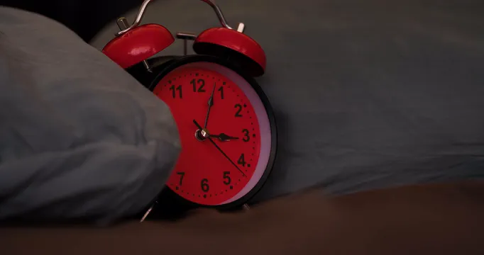 Horizontal video: An alarm clock in bed that rings the alarm 27454114. Duration: 59 seconds. Resolution: 4096x2160