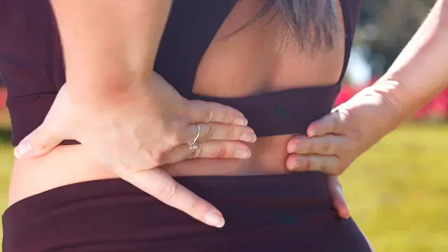 Horizontal video: Close up view of a woman massaging her back 7297842. Duration: 11 seconds. Resolution: 3840x2160