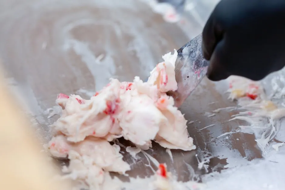 Close-up of a Person Preparing Ice Cream