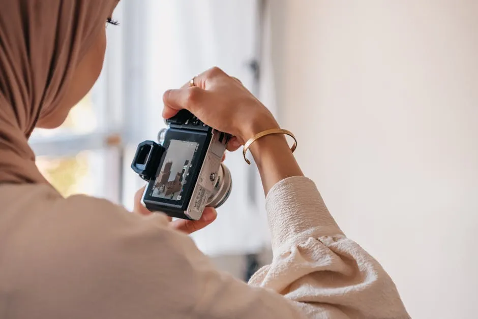 Close Up Shot of a Person Taking Photo with a Camera