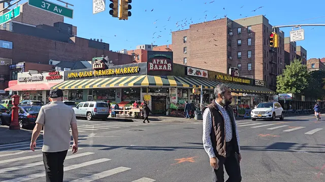 Horizontal video: Bustling jackson heights indian grocery market 29062844. Duration: 10 seconds. Resolution: 3840x2160