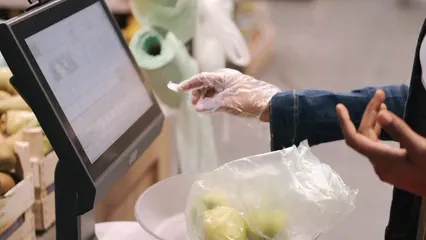 Horizontal video: Woman weighing fresh fruit 5100073. Duration: 12 seconds. Resolution: 3840x2160