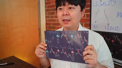 Horizontal video: A man recording a video about cryptocurrency 8369945. Duration: 15 seconds. Resolution: 1920x1080