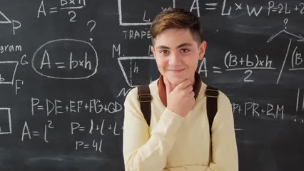 Horizontal video: Boy in yellow sweater smiling while looking at the camera 5199635. Duration: 11 seconds. Resolution: 3840x2160