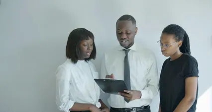 Horizontal video: Man holding a clipboard while talking to colleagues 9464312. Duration: 30 seconds. Resolution: 4096x2160