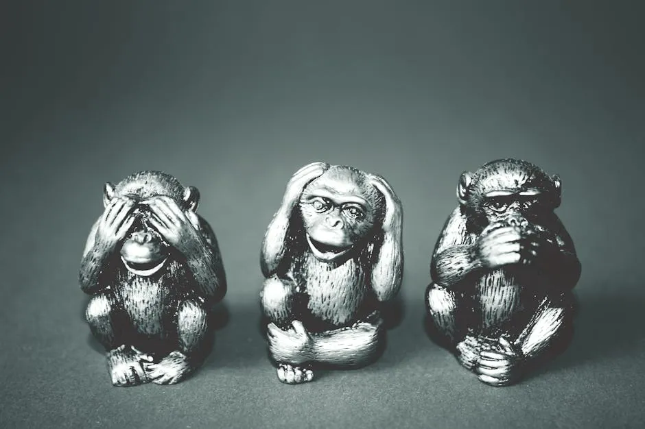 Grayscale Photography of Three Wise Monkey Figurines