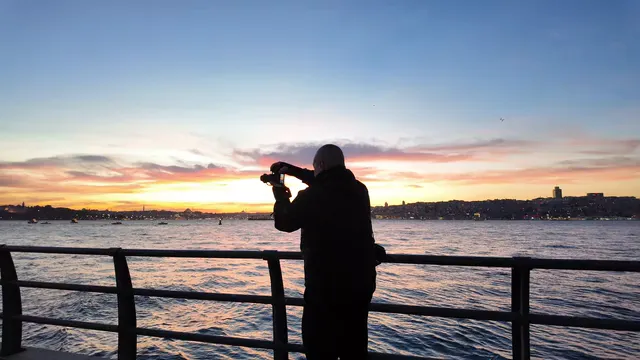 Horizontal video: Silhouette photography at sunset by the sea 28941862. Duration: 12 seconds. Resolution: 3840x2160
