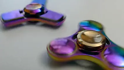 Horizontal video: Fidget spinner toys in motion 3114983. Duration: 21 seconds. Resolution: 3840x2160