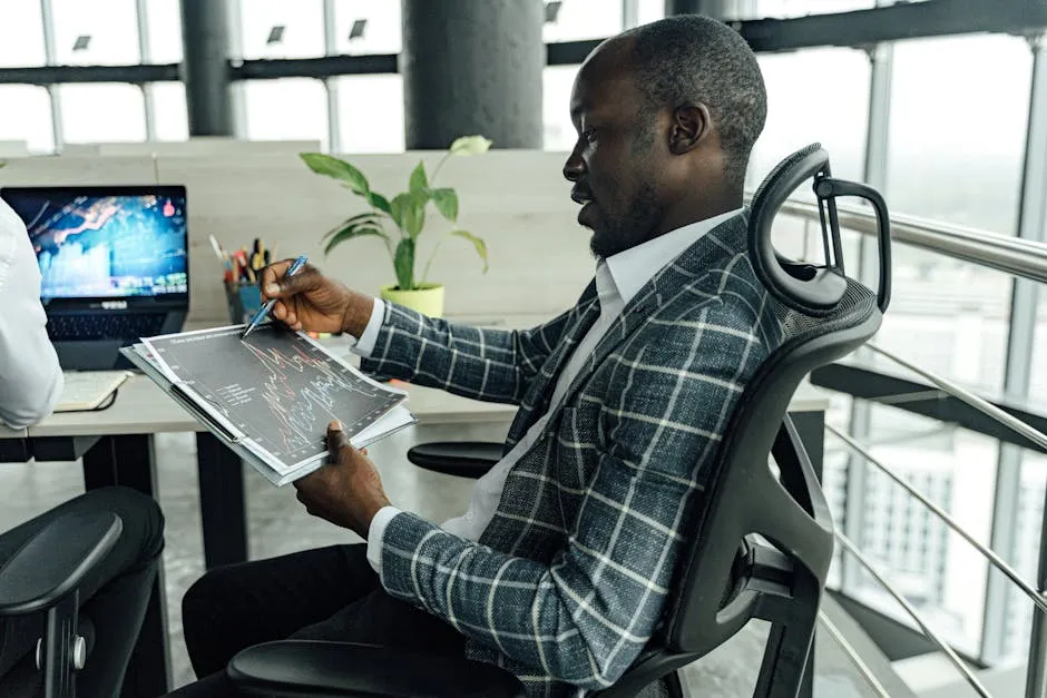 Professional Business Man looking at Charts