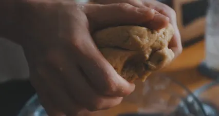 Horizontal video: Person kneading a cookie dough 6092038. Duration: 20 seconds. Resolution: 4096x2160