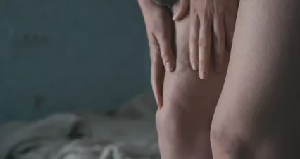 Horizontal video: A person touching it s leg with bruises 8191272. Duration: 4 seconds. Resolution: 4096x2160