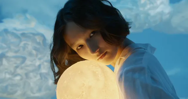 Horizontal video: A woman embracing a moon 8262772. Duration: 54 seconds. Resolution: 4096x2160