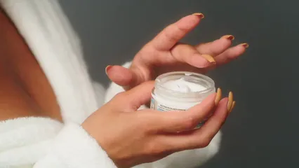 Horizontal video: A woman applying cream on her shoulder 8955782. Duration: 52 seconds. Resolution: 3840x2160