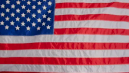 Horizontal video: A fist in front of the american flag 9413465. Duration: 14 seconds. Resolution: 1920x1080