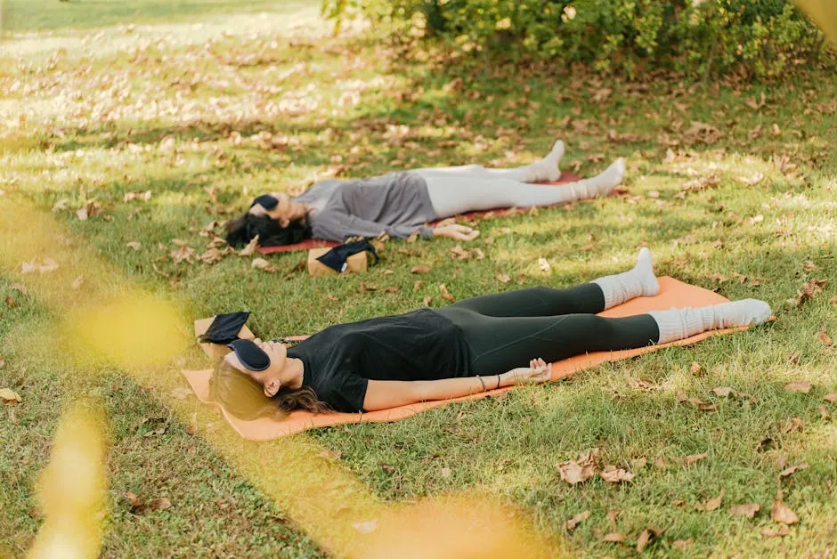 Women Practising Yoga Outdoors 