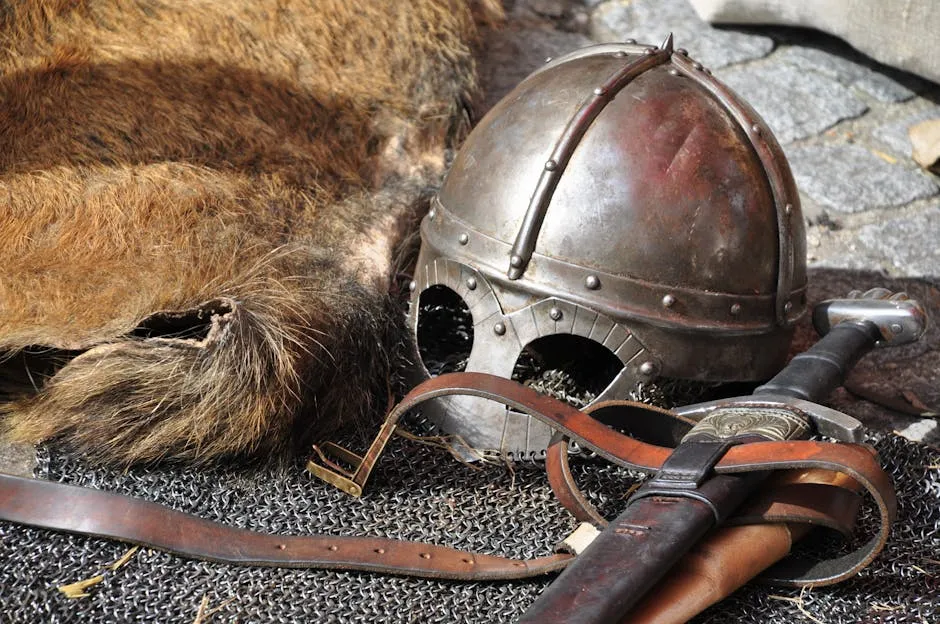 Black Steel Helmet Near Black and Gray Handle Sword