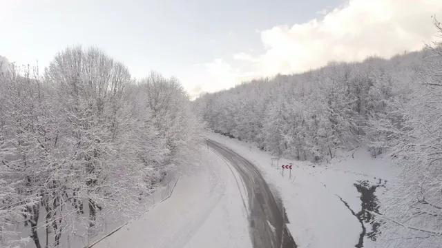 Horizontal video: Aerial winter forest road covered in snow 28946658. Duration: 35 seconds. Resolution: 1920x1080
