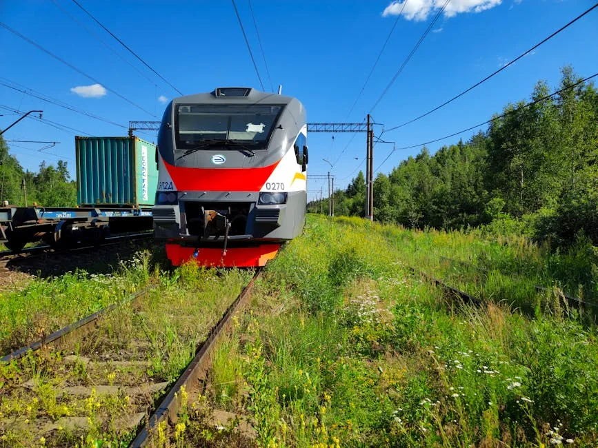 Modern Train on Scenic Railway Track
