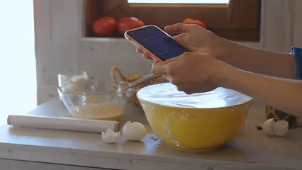 Horizontal video: Person putting a timer on a phone 4122379. Duration: 5 seconds. Resolution: 3840x2160