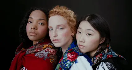 Horizontal video: Three women in traditional clothing pose for a photo 4973021. Duration: 33 seconds. Resolution: 4096x2160