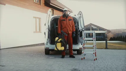 Horizontal video: Man holding a vacuum cleaner 6195140. Duration: 18 seconds. Resolution: 3840x2160