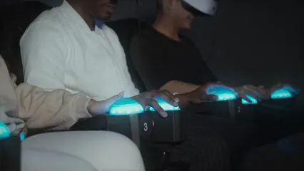 Horizontal video: Gamers playing video game in virtual reality mode 6499154. Duration: 15 seconds. Resolution: 3840x2160