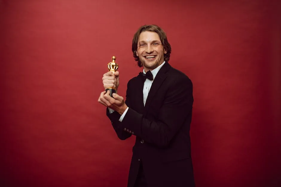 A Happy Man in a Black Suit Holding His Trophy