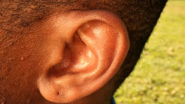 Horizontal video: Extreme close up shot of a person s ear 7298066. Duration: 13 seconds. Resolution: 3840x2160