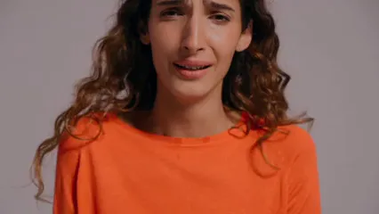 Horizontal video: A woman crying while hugging herself 8626655. Duration: 18 seconds. Resolution: 1920x1080