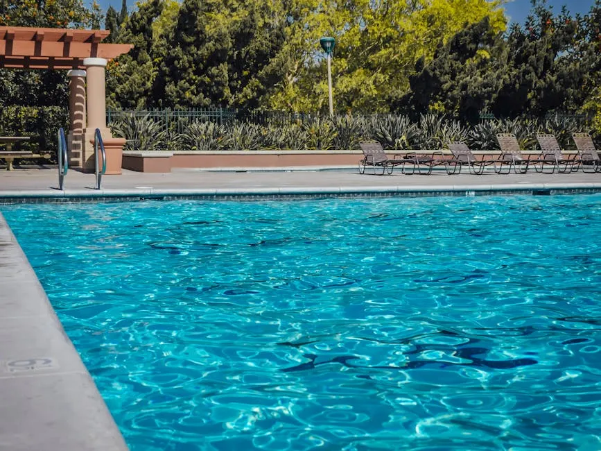 Blue Swimming Pool Near Green Trees