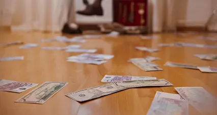 Horizontal video: A man s money scattered on the floor 8718629. Duration: 38 seconds. Resolution: 4096x2160